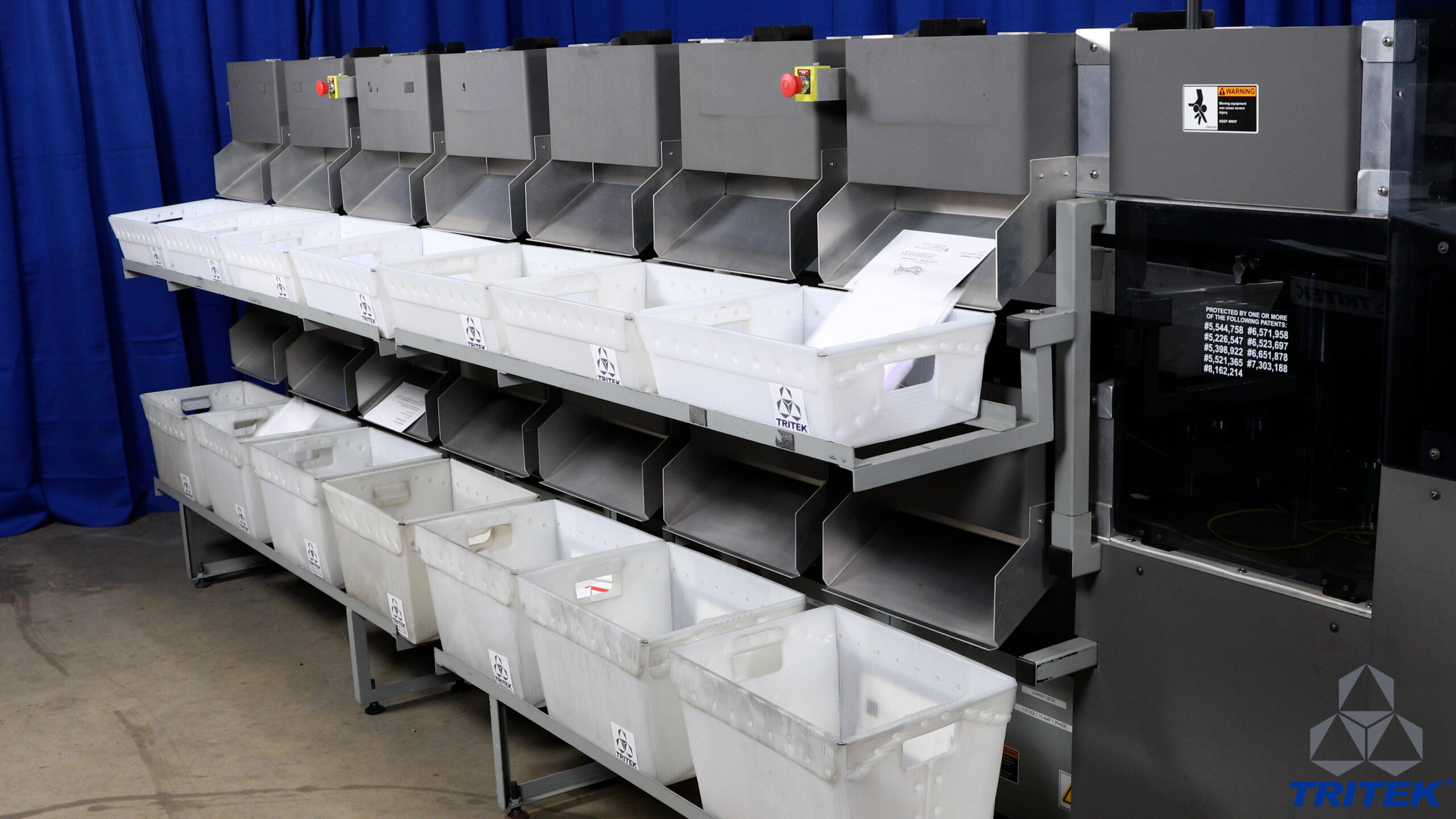 Sorted mail in trays on a Tritek Multi-Level Sorter