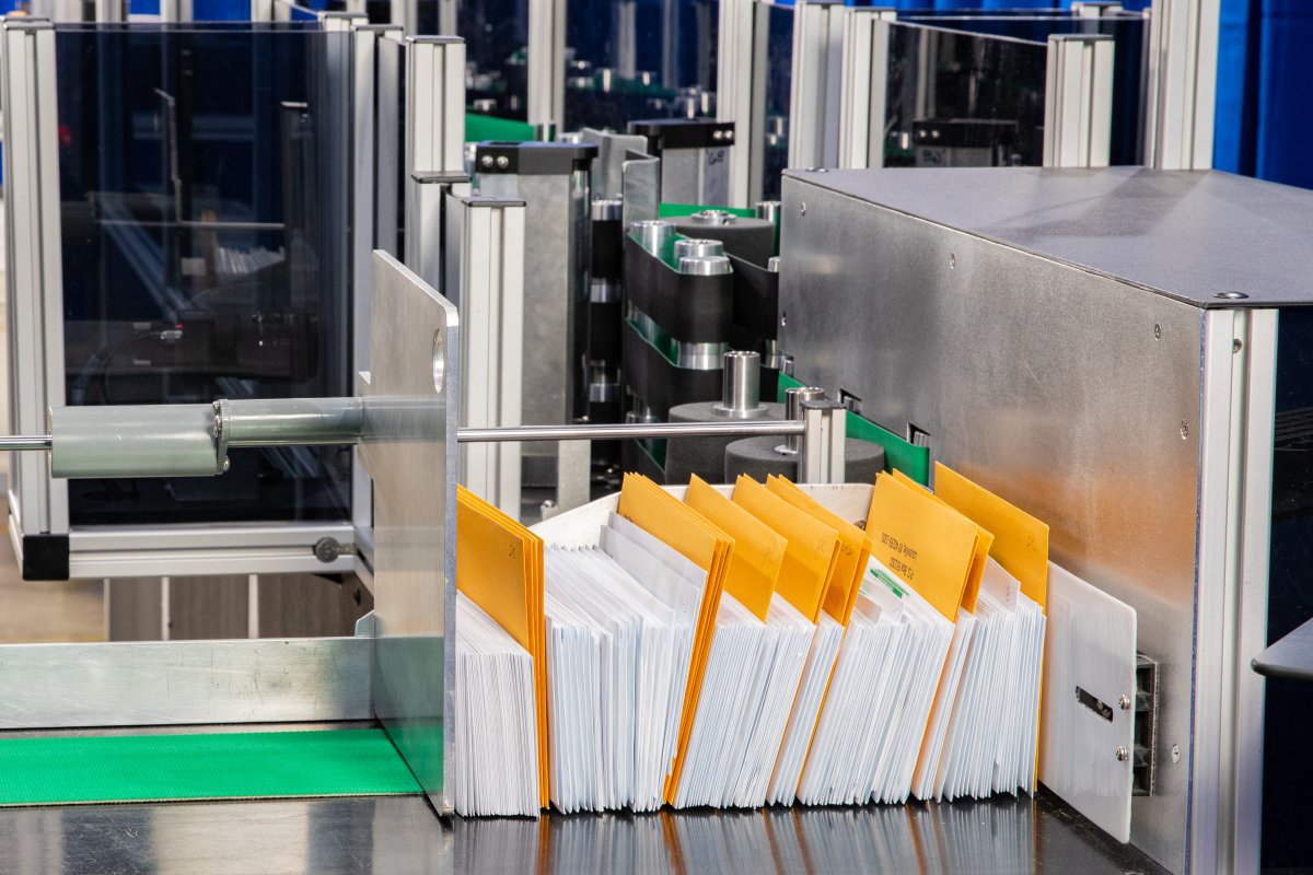 Envelopes staged in a Tritek sorter feeder